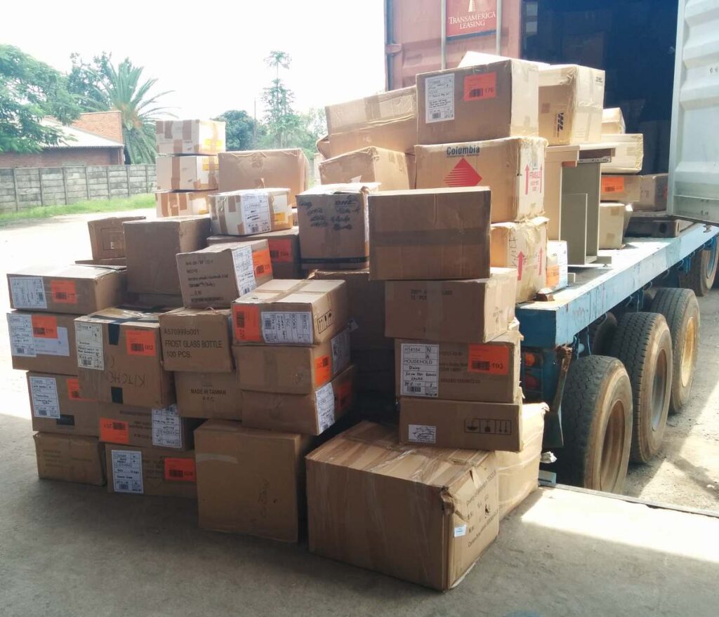 Urunji offloading a container